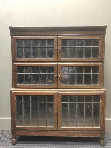 Lot 614 - A three tier oak sectional bookcase 114 x 89 x...