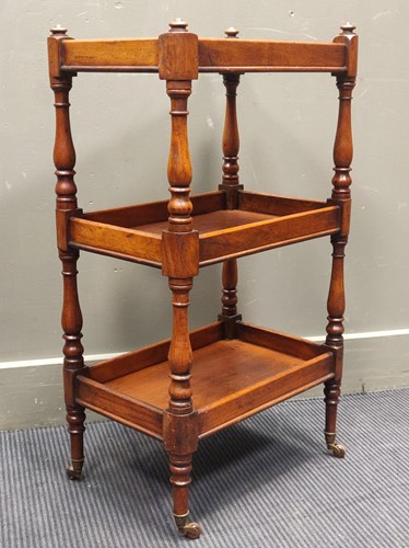 Lot 568 - A three-tier whatnot 81.5 x 46 x 31cm