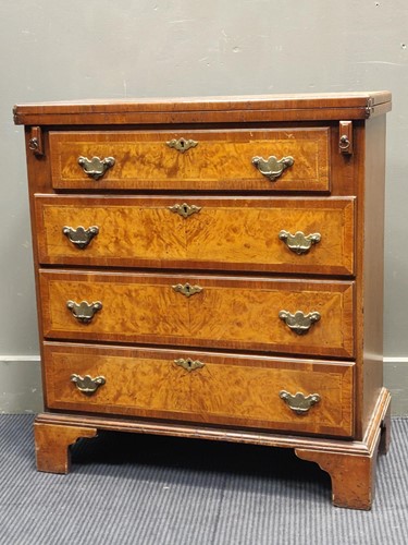 Lot 617 - A Georgian style walnut bachelors chest 76 x...
