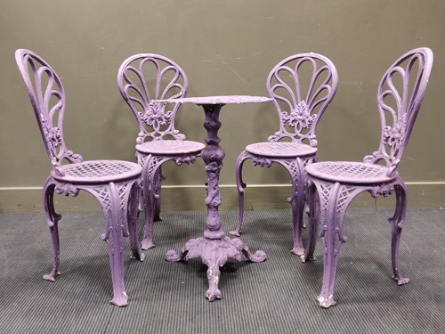 Lot 692 - A purple painted cast metal garden set to...