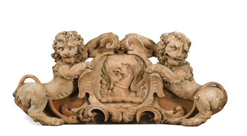 Lot 406 - A carved limewood crest, 18th century