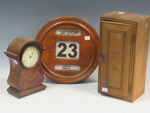 Lot 43 - A small pine tobacco cupboard, branded inside...