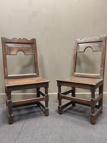 Lot 597 - A pair of 18th century style oak chairs...
