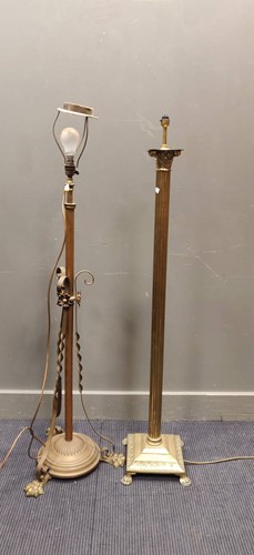 Lot 623 - A brass standard lamp with corinthian column...