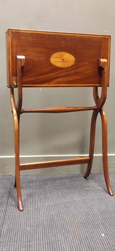 Lot 596 - A 19th century inlaid mahogany folding games...