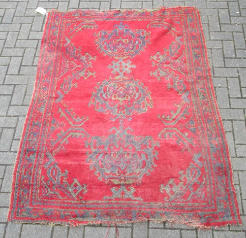 Lot 677 - A red 'Turkey' rug 196 x 144cm
