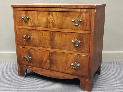 Lot 576 - A 19th century mahogany chest of three long...