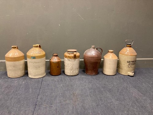 Lot 511 - Eight stoneware flagons, some branded 'GAYMERS...