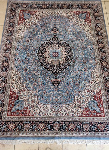 Lot 611 - A hand-knotted Kirman carpet, with cebtral...