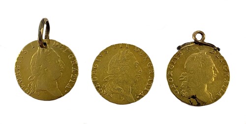 Lot 491 - Three George III guineas