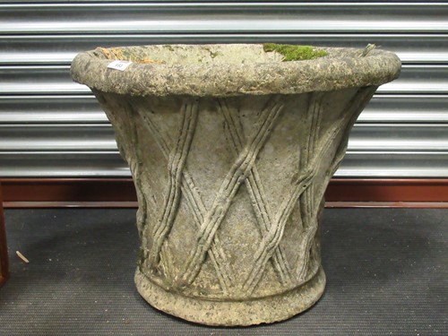 Lot 693 - A composite garden planter with lattice...