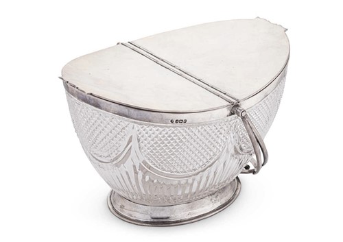 Lot 614 - An Edward VII silver and cut glass swing handled biscuit container
