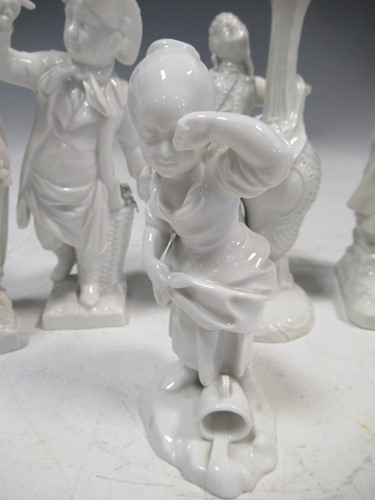 Lot 3 - Five KPM white glazed porcleain figures; two...