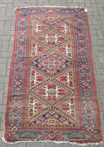Lot 609 - A red ground hamadan rug, 218 x 113cm