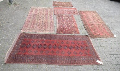 Lot 700 - A Bokhara rug woven in the traditional colours...