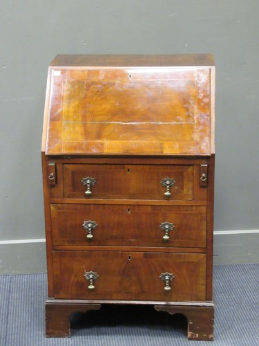 Lot 502 - A George III style walnut veneered small...