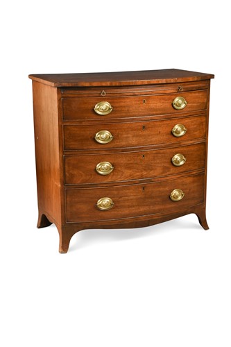 Lot 510 - A George III mahogany bow fronted chest