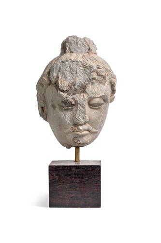 Lot 50 - A Gandharan grey schist head of Buddha, 3rd/4th century