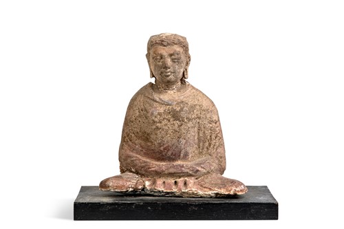 Lot 41 - A Gandharan terracotta seated Bodhissatva, 3rd-5th century