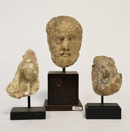 Lot 57 - A Gandharan stucco head of a bearded man, North West India/Pakistan, 3rd-5th century
