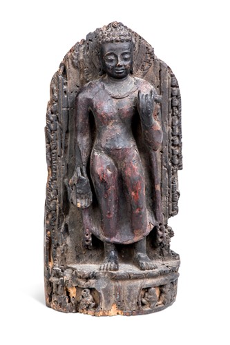 Lot 64 - A Khmer lacquered wood standing figure of Buddha, 19th century in 12th century style