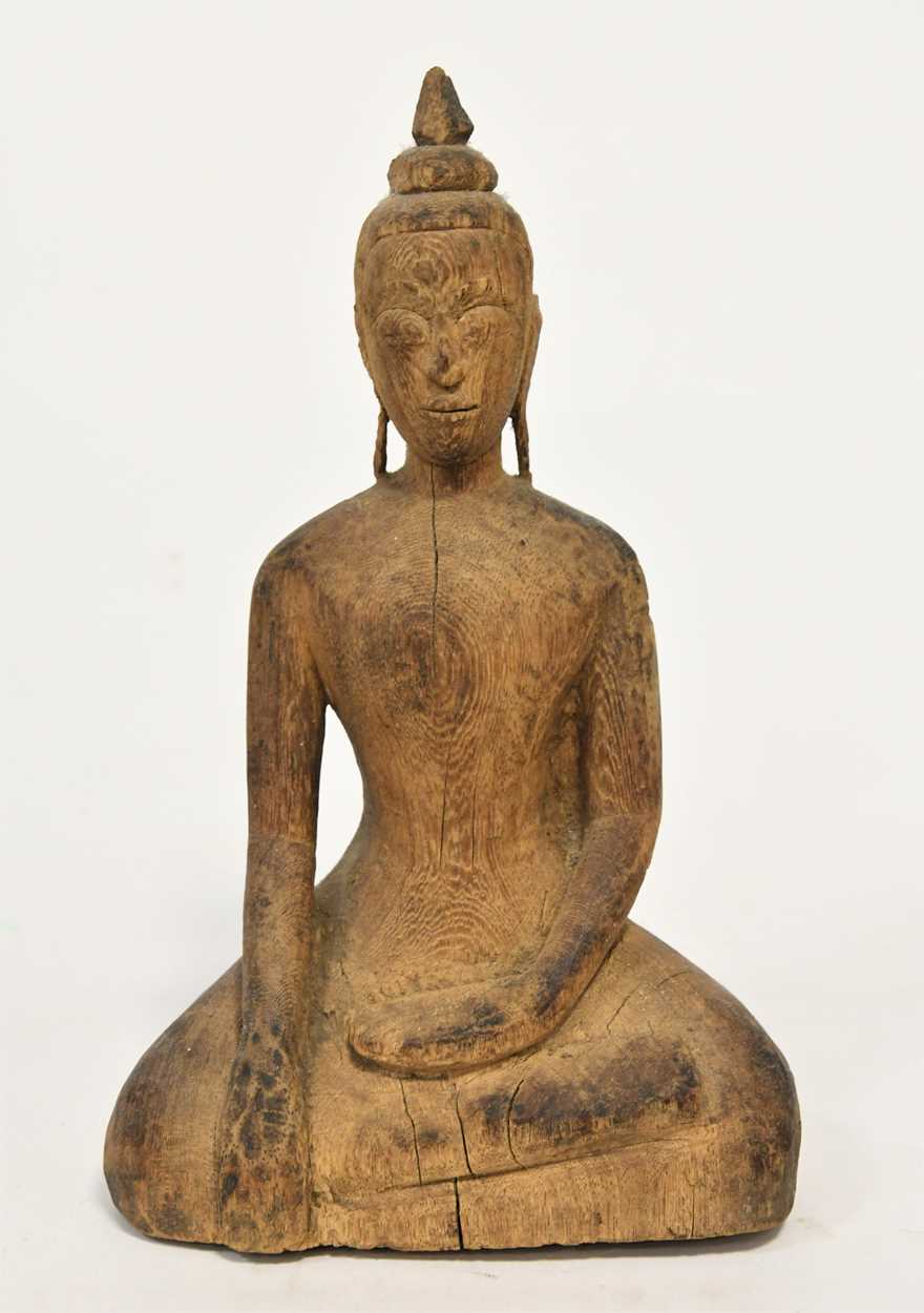 Lot 80 - A Thai carved wood seated Buddha, Sukothai, early 19th century
