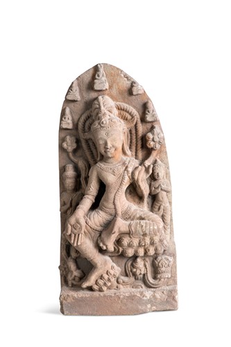 Lot 63 - A Khmer cream sandstone Maitreya group with acolytes, Baphuon style, 10th century