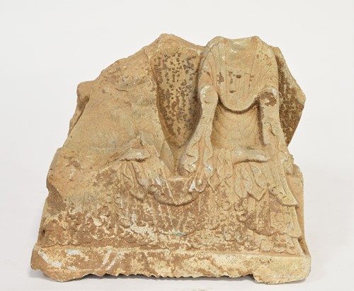 Lot 110 - A Chinese white marble fragment of two seated Buddhist deities, Wei Style