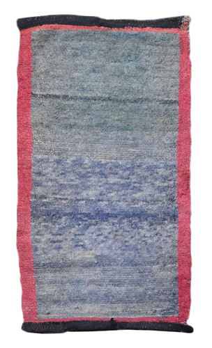 Lot 131 - A provincial Tibetan wool rug, circa 1910-20