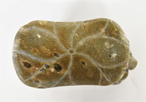 Lot 98 - A Chinese green stone buffalo headrest/pillow, Song Style