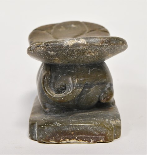 Lot 98 - A Chinese green stone buffalo headrest/pillow, Song Style