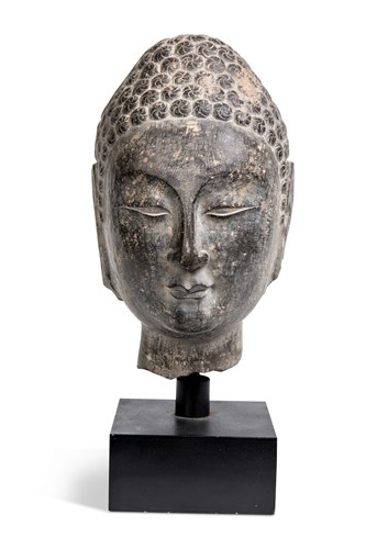 Lot 102 - A Northern Qi -Sui Dynasty style black stone Buddha head