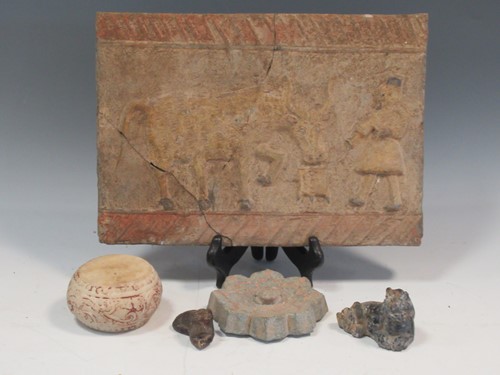 Lot 166 - 1 Han dynasty ox and man tile, a lotus stone,...