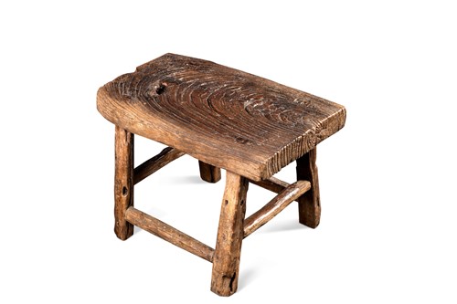 Lot 115 - A Chinese elm provincial small stool, late Qing Dynasty