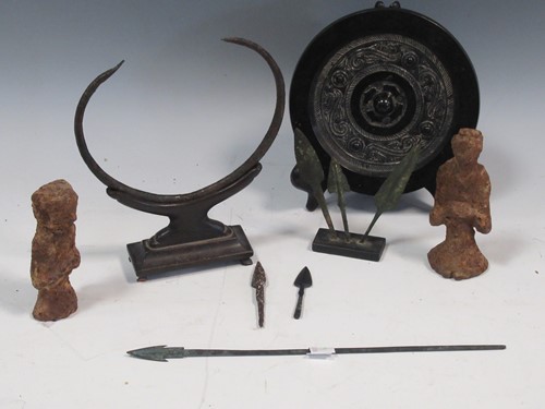 Lot 164 - 6 bronze arrows; a stone circular mirror, 2...