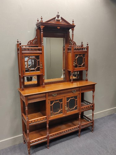 Lot 529 - An Aesthetic period mirror-back mahogany...