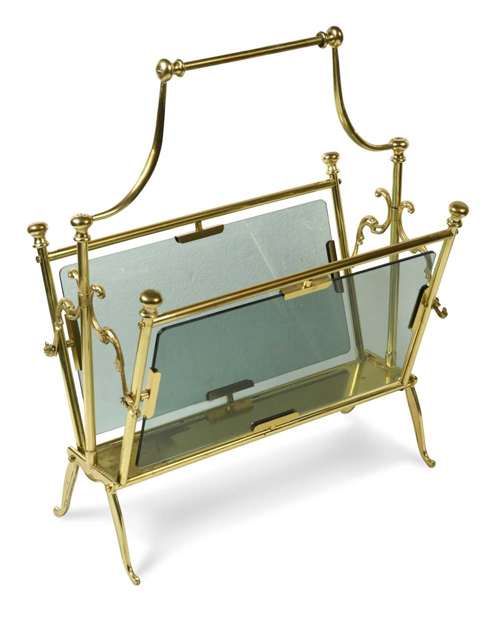 Lot 220 - A 1970s brass and glass magazine rack,