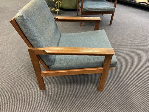 Lot 217 - Illum Wikkelso for Niels Eilersen, a Danish teak Capella sofa and matching armchair, 1960s