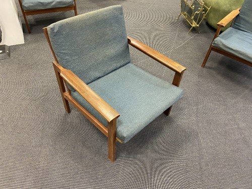 Lot 217 - Illum Wikkelso for Niels Eilersen, a Danish teak Capella sofa and matching armchair, 1960s