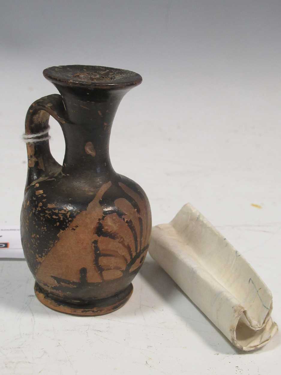Lot 136 - A small ancient Greek vase, 8cm high...