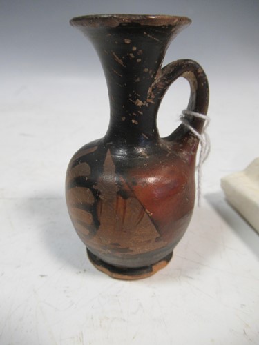 Lot 136 - A small ancient Greek vase, 8cm high...