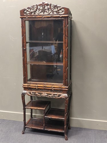 Lot 495 - A Chinese naturalistic hard wood cabinet on...