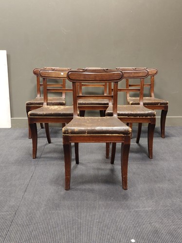 Lot 600 - A set of six Regency mahogany sabre leg chairs...