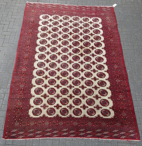 Lot 678 - A silk Bokhara carpet, 307 x 218cm