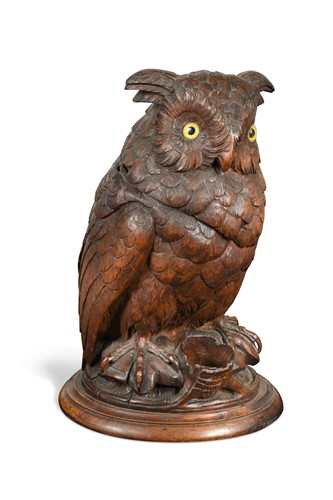 Lot 348 - A Black Forest carved wood tobacco jar, late 19th or early 20th century