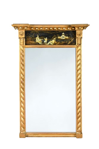 Lot 545 - A Regency verre églomisé and gilt wood pier mirror