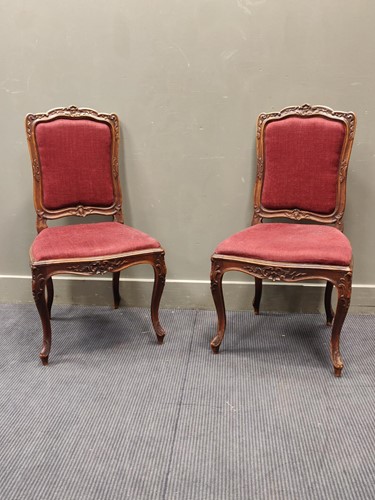 Lot 508 - A pair of Hepplewhite style mahogany elbow...