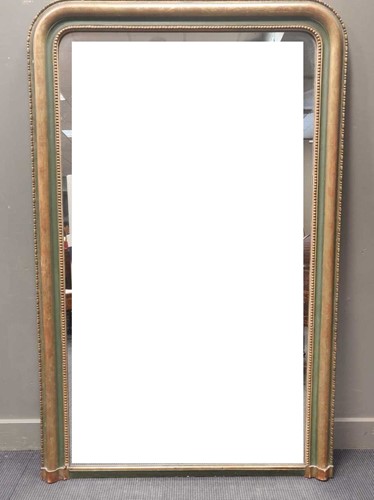 Lot 553 - A 19th century green and gilt pier mirror, in...