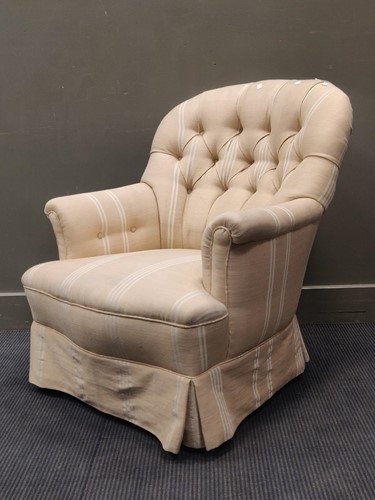 Lot 615 - A button backed upholstered nurising chair...