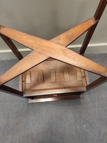 Lot 414 - A George III small mahogany two-tier reading table